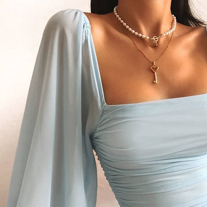Sukienka Mini Bodycon z Bufkami
